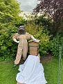 Me pulling a silly pose - just about to open the box and shake the bees onto the sheet, they then scuttle up and into the hive all being well